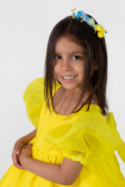 Yellow organza dress with puff sleeves